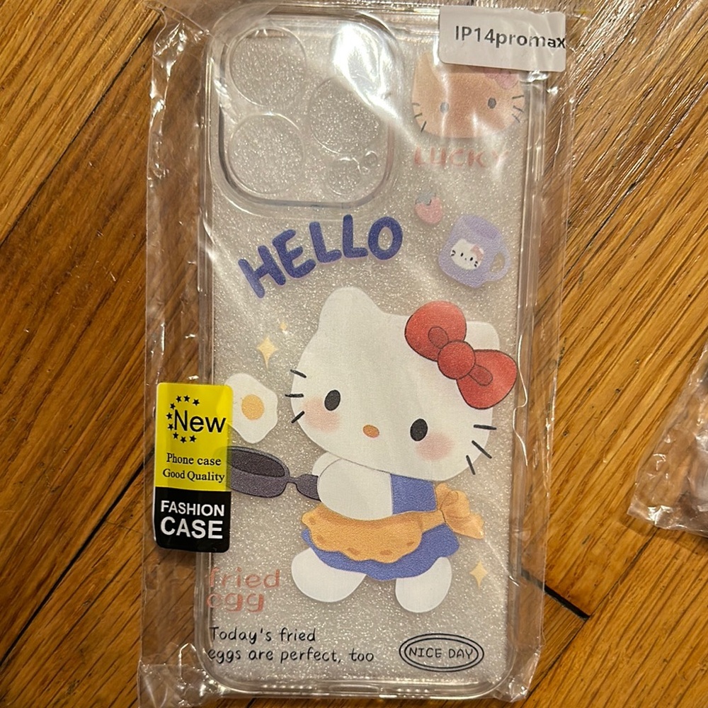 Hello Kitty iPhone 14 Pro Max Case - Clear with Red Bow